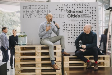 Christopher Cabaldon discussing his 20 years experience as mayor of West Sacramento on the Shared Cities Live Mic State at reSITE 2019 with reSITE founder, Martin Barry | Photo courtesy of Jakub Červenka